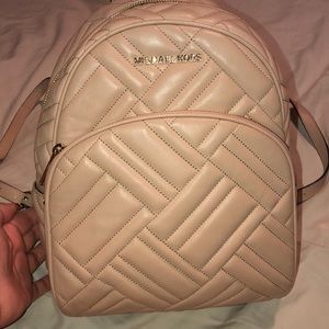 Michael Kors small backpack in the style “Abbey”